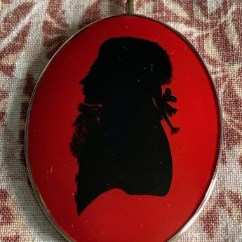 Charles Rosenberg, anti-Etruscan style silhouette on glass in a locket frame