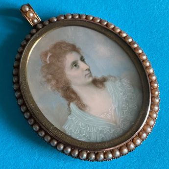 Charles Robertson, miniature portrait of a lady in a baby blue dress